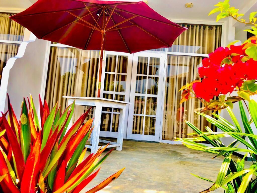 deluxe triple room | terrace/patio