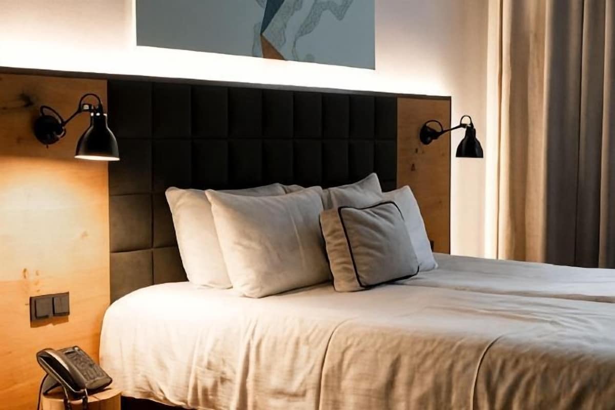 Ropa de cama de alta calidad y minibar