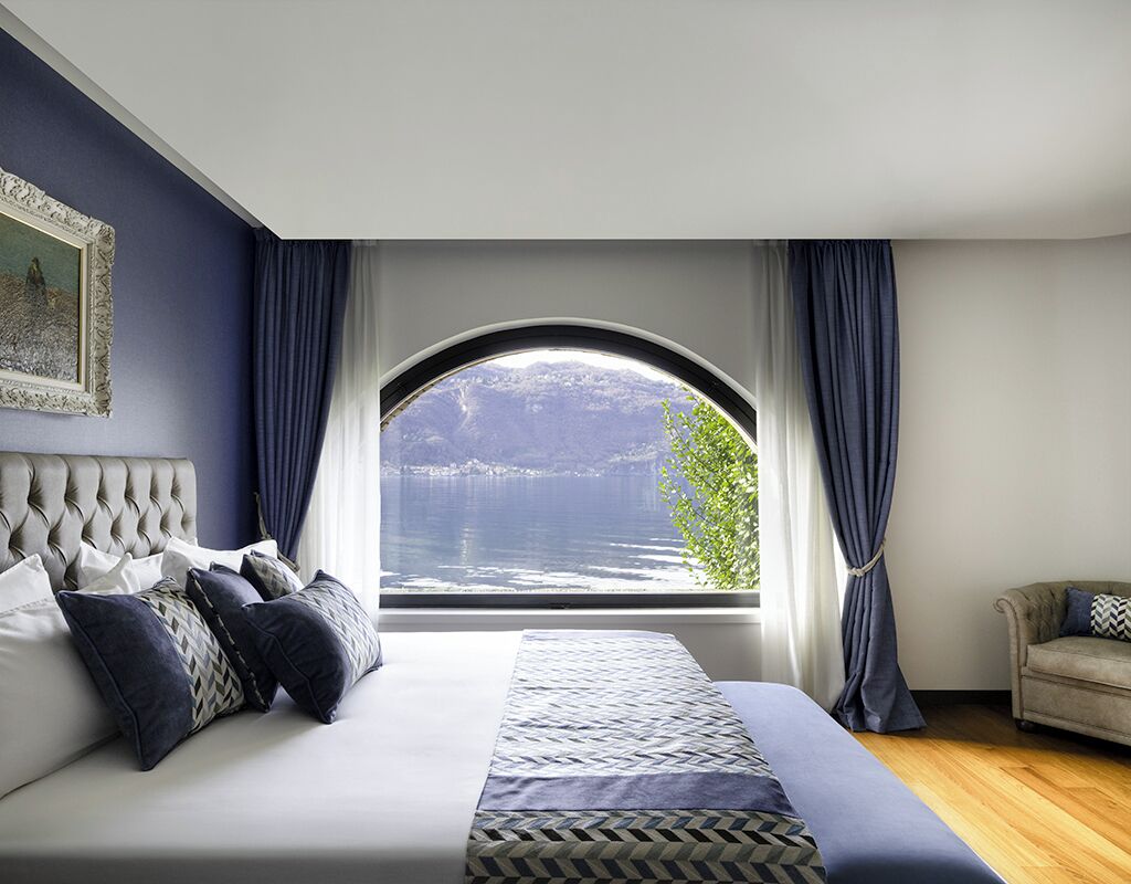 Suíte júnior, vista para o lago, em edifício anexo (private garden Darsena) | Lençóis italianos Frette, roupas de cama premium, edredons de pluma