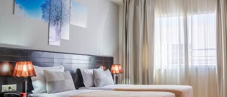 Ropa de cama de alta calidad y cortinas blackout