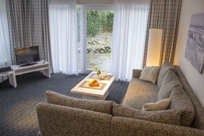 Family Suite, 2 Bedrooms, Kitchen, Garden Area | Living room - Nordsee Domizil Schobüll (Husum)
