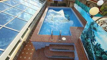 Alberca al aire libre por temporada