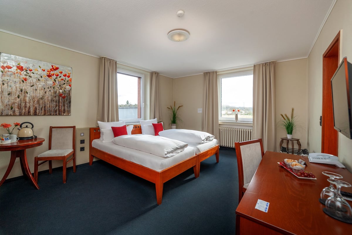 Premium bedding, down duvets, minibar, in-room safe