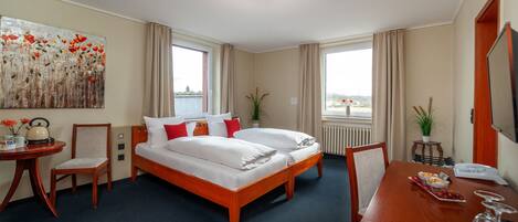 Ropa de cama de alta calidad, cubrecamas y minibar