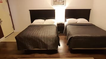Triple Room, Non Smoking | Individually decorated, individually furnished, desk, blackout drapes