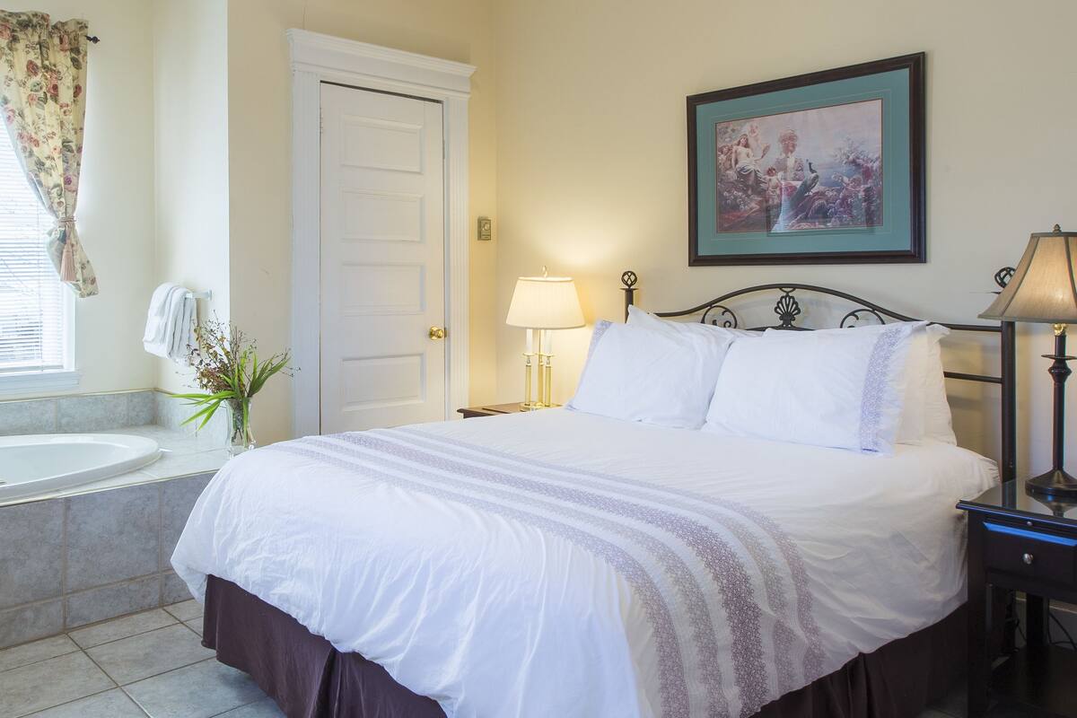 Deluxe suite, 2 slaapkamers | Een strijkplank/strijkijzer, gratis babybedden, gratis extra bedden