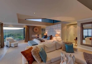 コンフォート ルーム | リビング エリア | 30 インチのテレビ (ケーブル放送視聴可)、iPod ドック