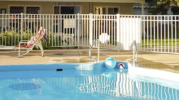 Seasonal outdoor pool, open 10:00 AM to 8:00 PM, sun loungers