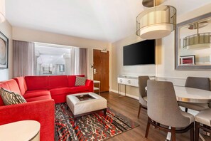 55-inch flat-screen TV with premium TV channels, TV, DVD player