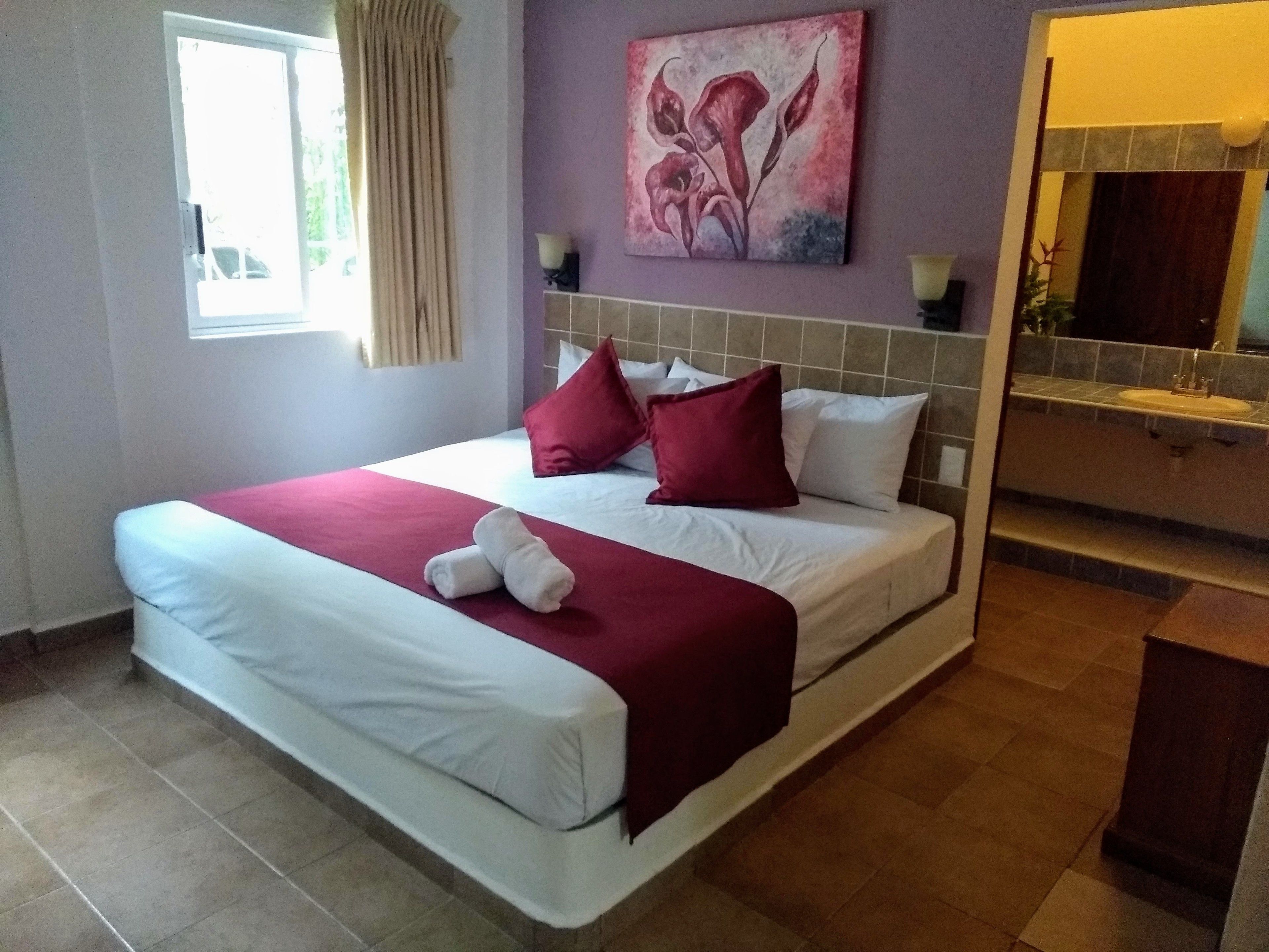 junior double room, 1 king bed | premium bedding, in-room safe, individually decorated, blackout curtains