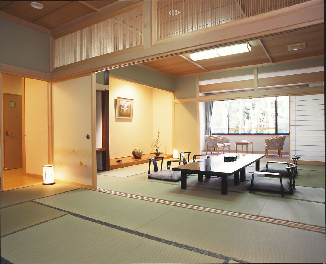 deluxe room, non smoking | living area | lcd tv