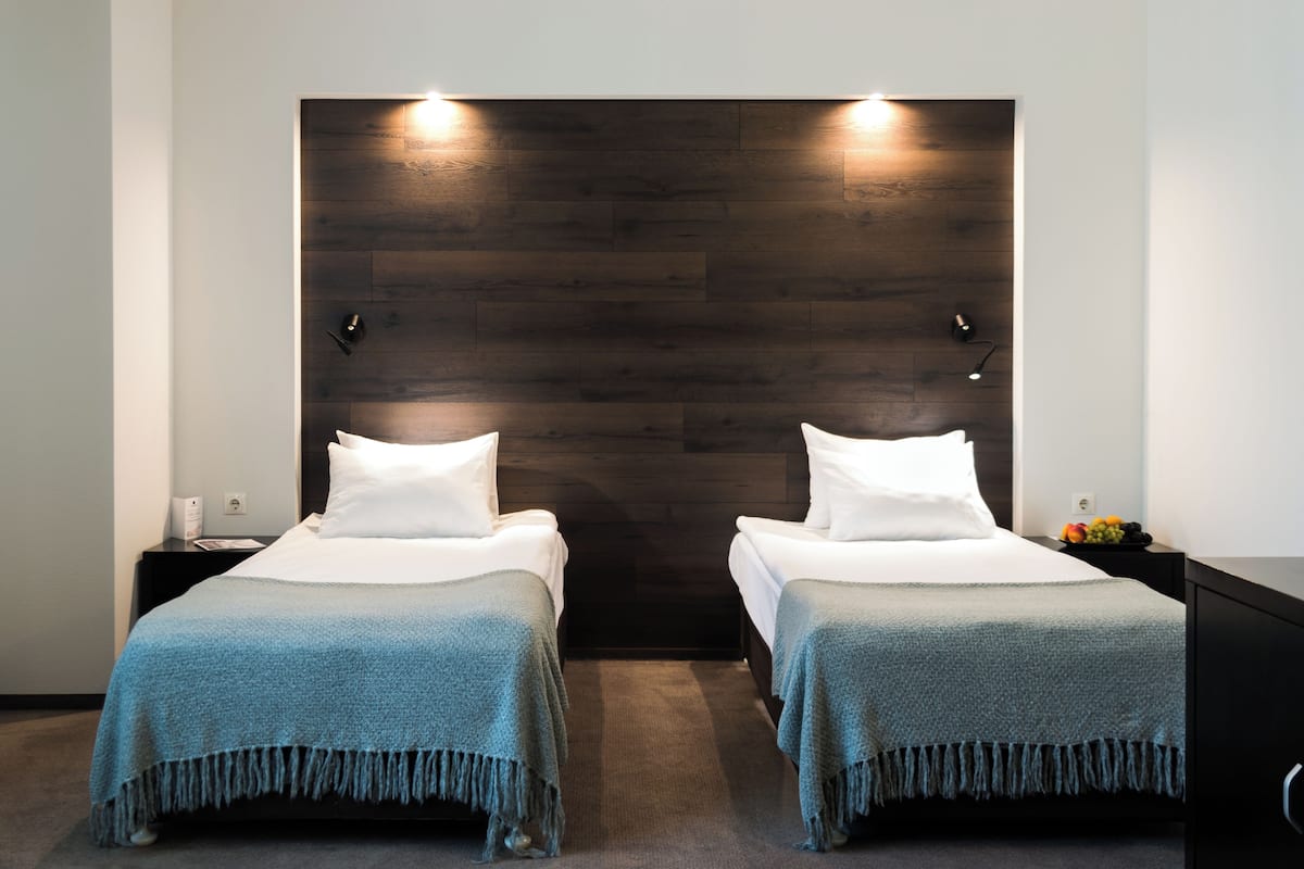 Superior Twin Room | Minibar, in-room safe, desk, soundproofing