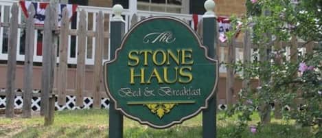 A sign for The Stone Haus Bed & Breakfast.