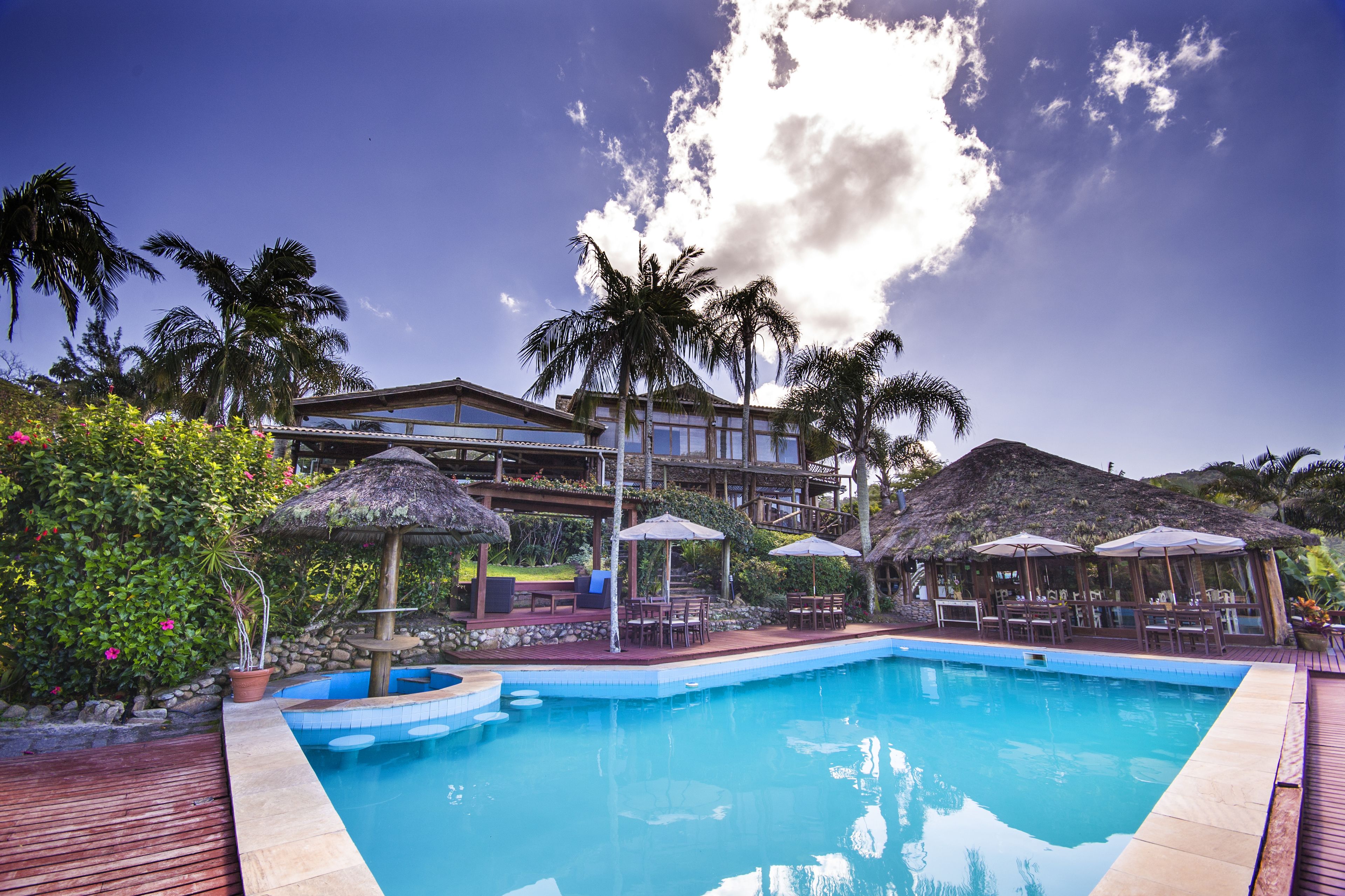 outdoor pool, pool umbrellas, pool loungers