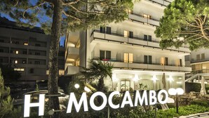 A modern hotel with a prominent sign reading "H MOCAMBO". - Hotel Mocambo (Cervia)