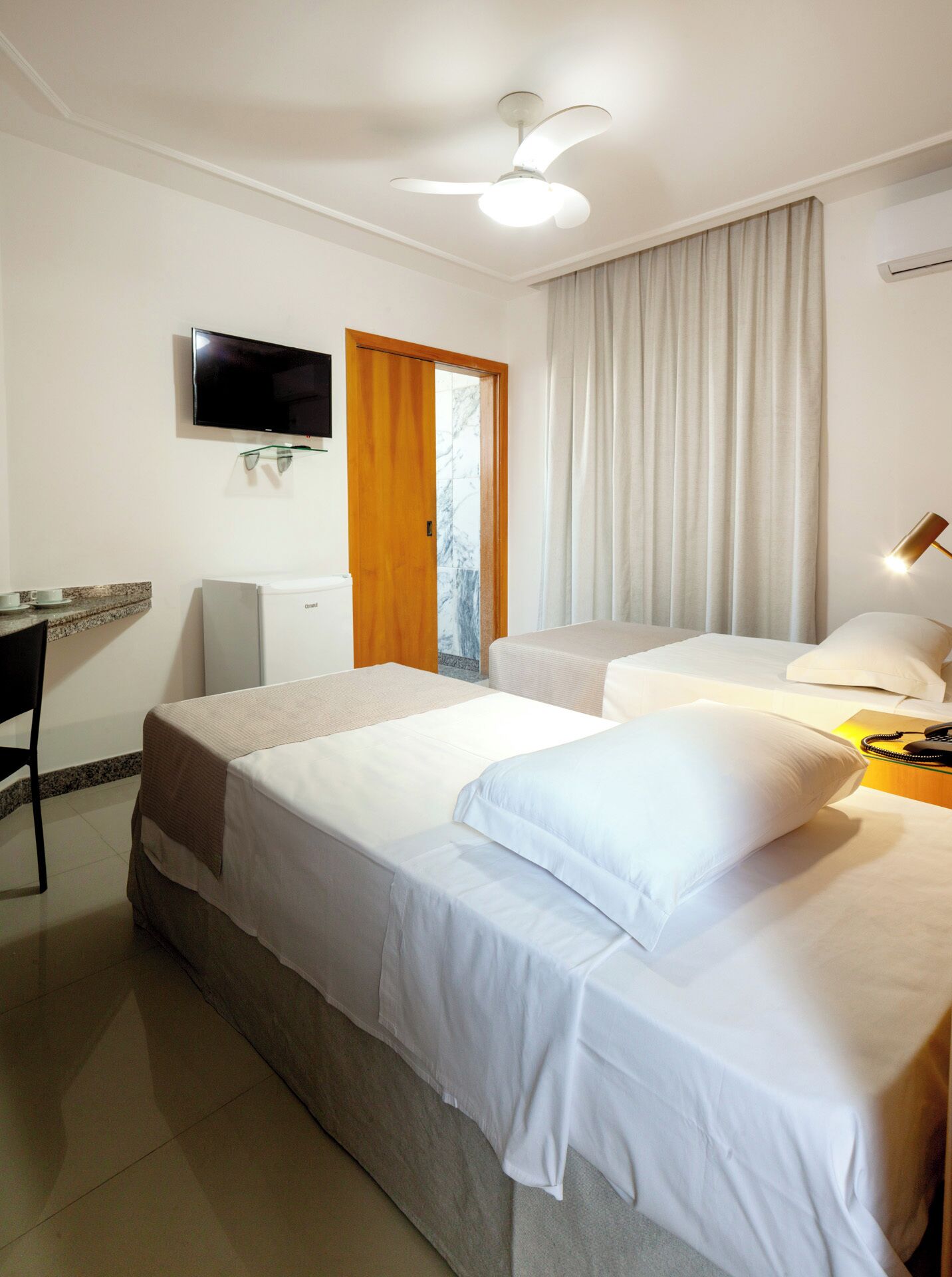 Twin Room | Minibar, desk, laptop workspace, free WiFi