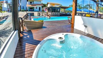 Relax by the pool or unwind in the hot tub on this resort's deck.