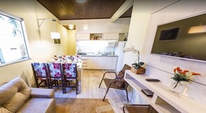 Chalé premium, 2 quartos | Área de estar