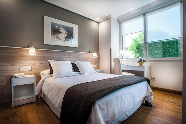 Economy Double Room (annex building) | Premium bedding, minibar, in-room safe, desk