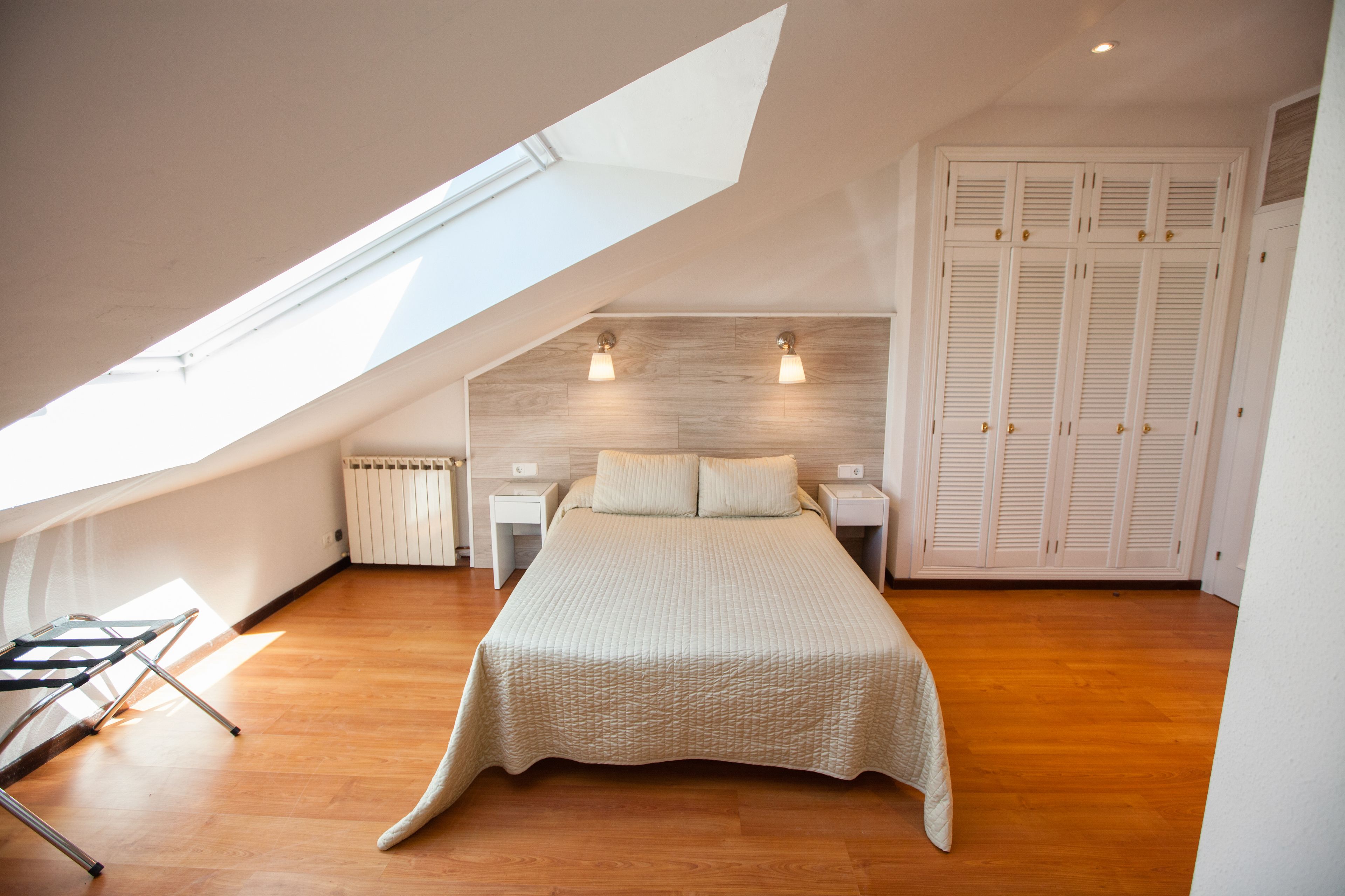 economy double room | premium bedding, minibar, in-room safe, desk