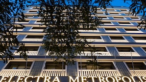 A building with the sign "ELECTRA METROPOLIS" indicating a hotel or similar establishment.