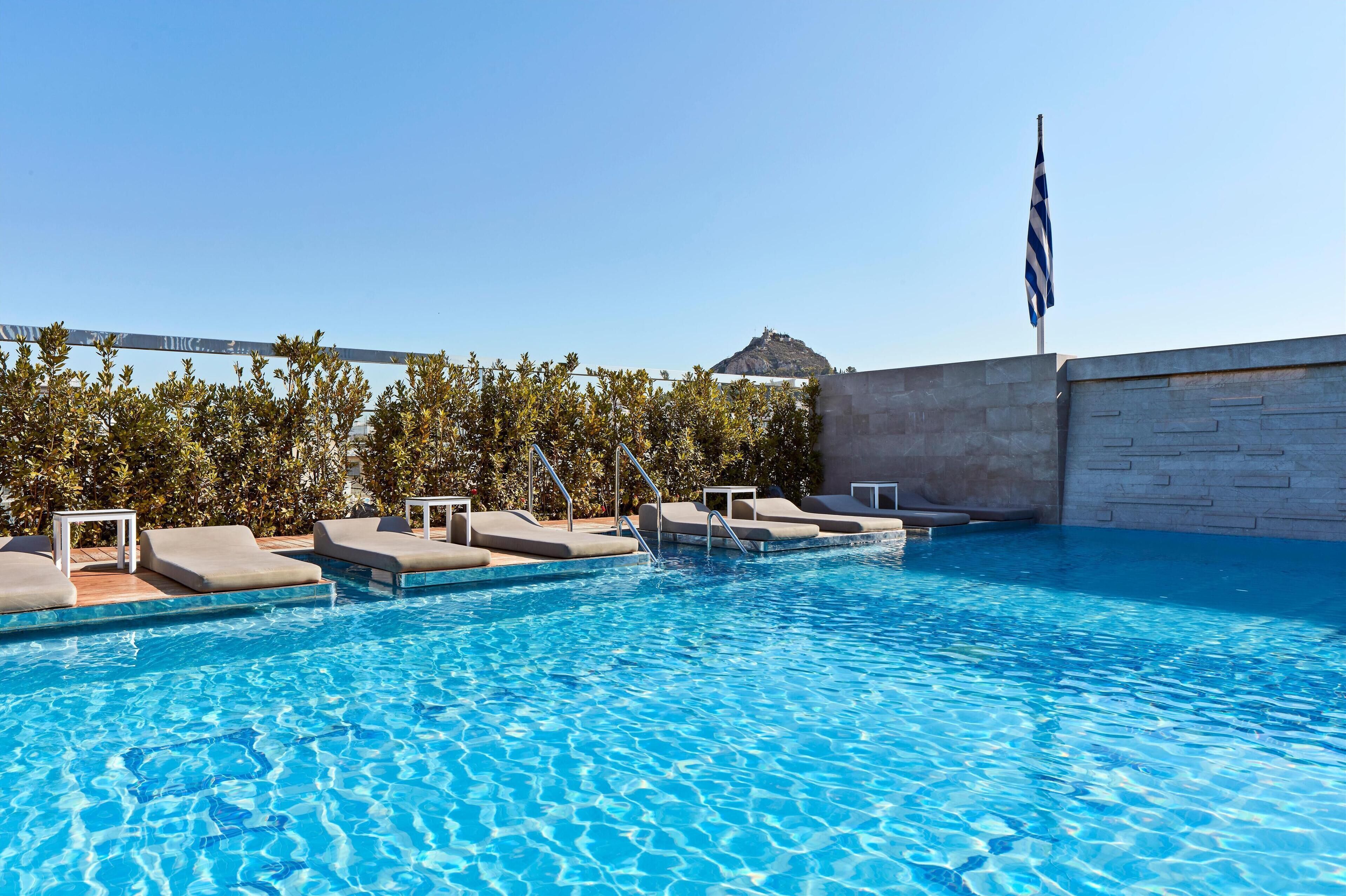 indoor pool, seasonal outdoor pool, pool umbrellas, pool loungers