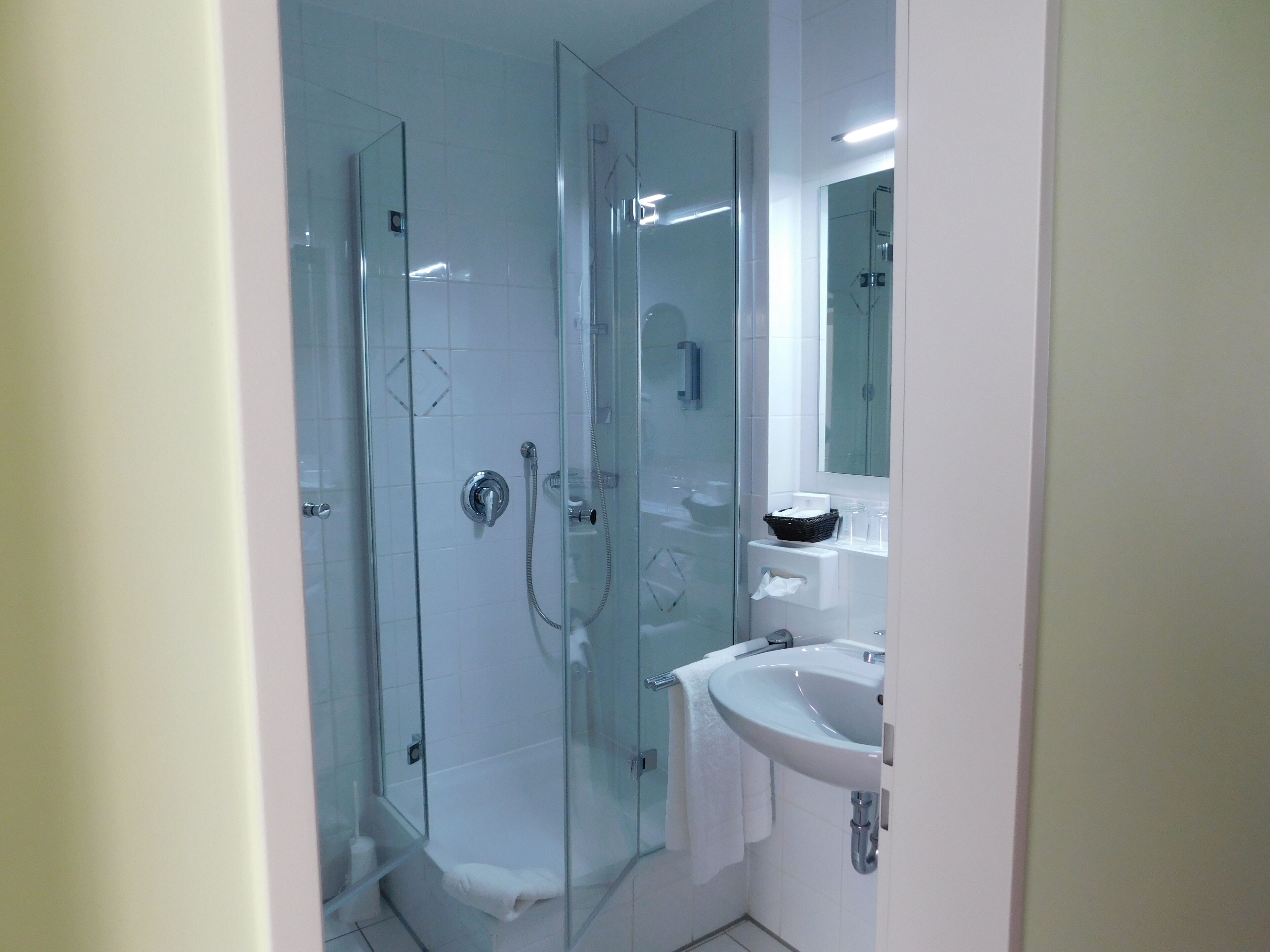 shower, free toiletries, hair dryer, towels