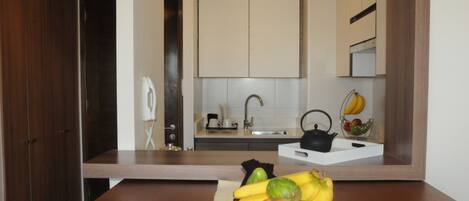 Full-size fridge, microwave, coffee/tea maker