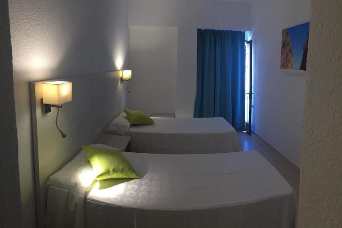 Blackout curtains, free cots/infant beds, bed sheets