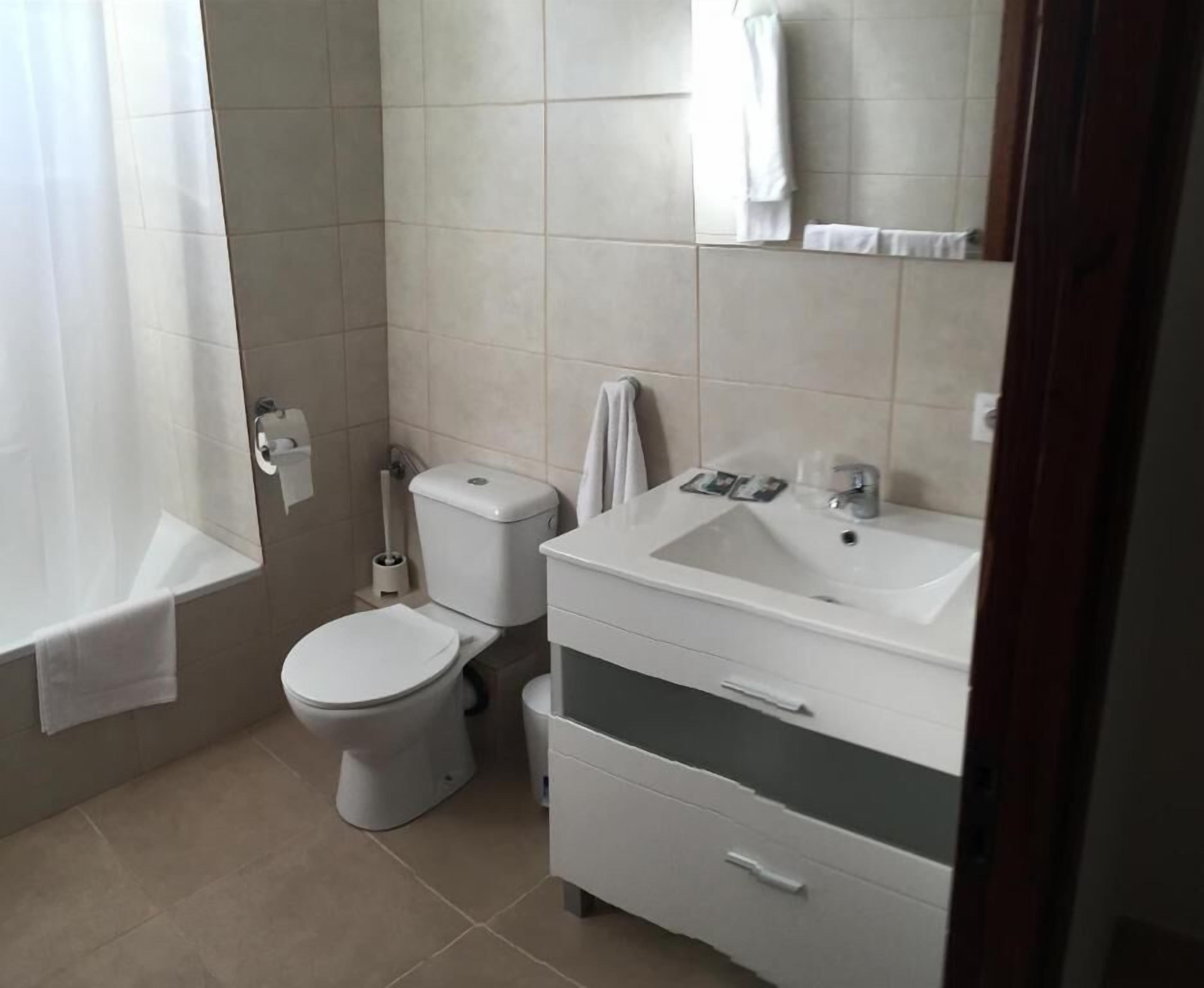 Family Triple Room, Balcony, City View | Bathroom | Hair dryer, towels, toilet paper