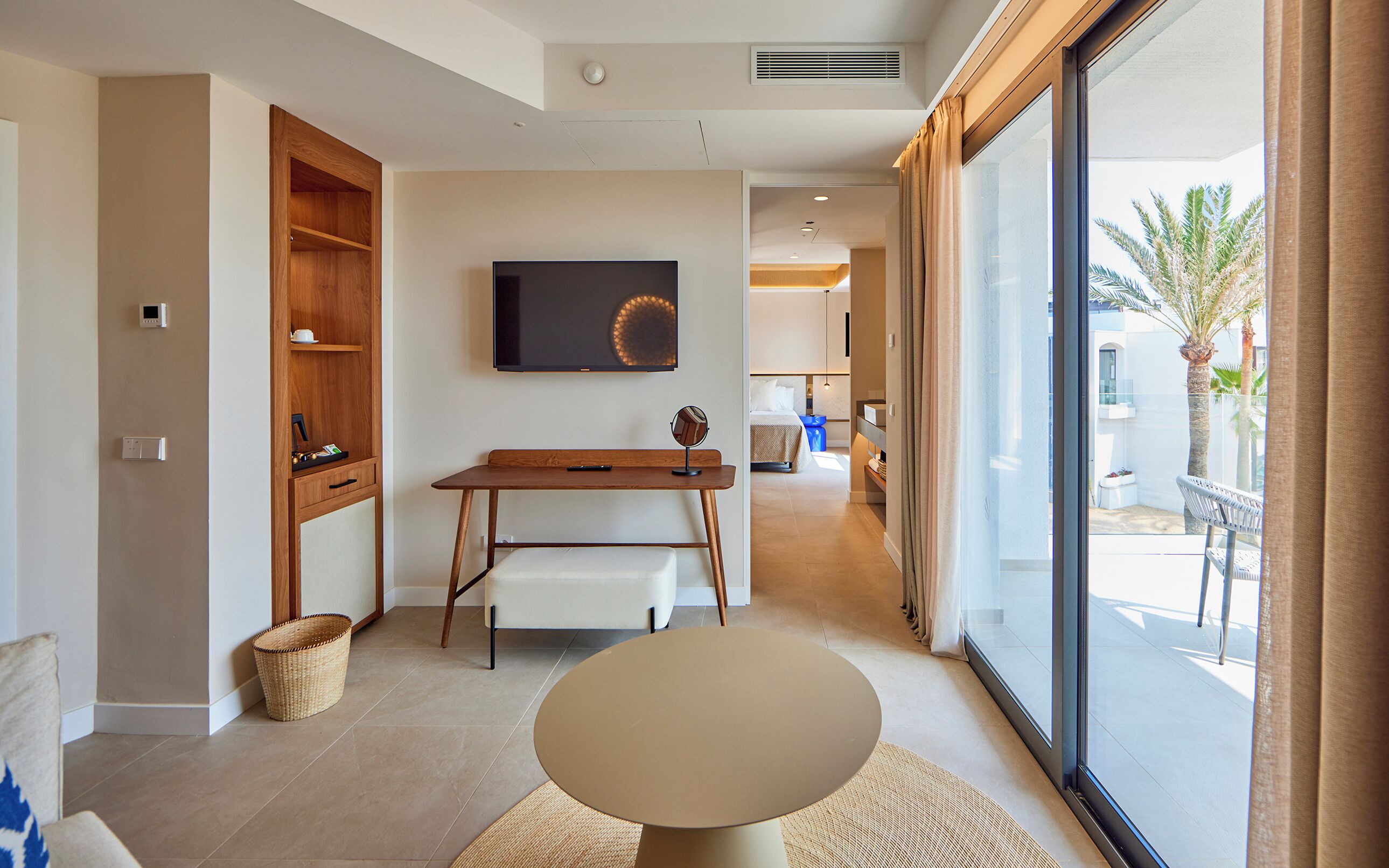 suite, balcony, sea view | living area | tv