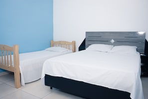 Quadruple Room, Multiple Beds | Minibar, iron/ironing board, free WiFi, bed sheets