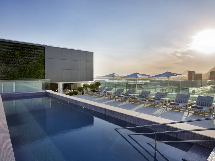 Outdoor pool, pool umbrellas, pool loungers