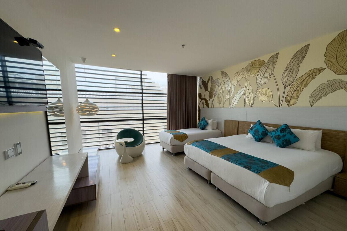 Luxe beddengoed, een minibar, een kluis op de kamer, een bureau