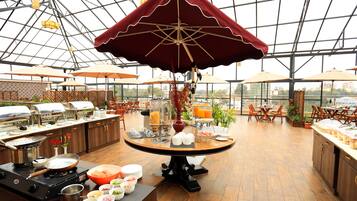 Daily buffet breakfast (USD 12 per person)