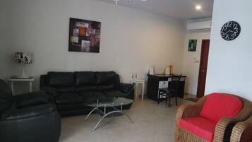 Villa, 3 Bedrooms, Pool View | Living area | Flat-screen TV