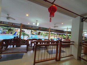 Deluxe Room, 1 Queen Bed, Refrigerator, Poolside | Terrace/patio - Moalboal Tropics (Moalboal)