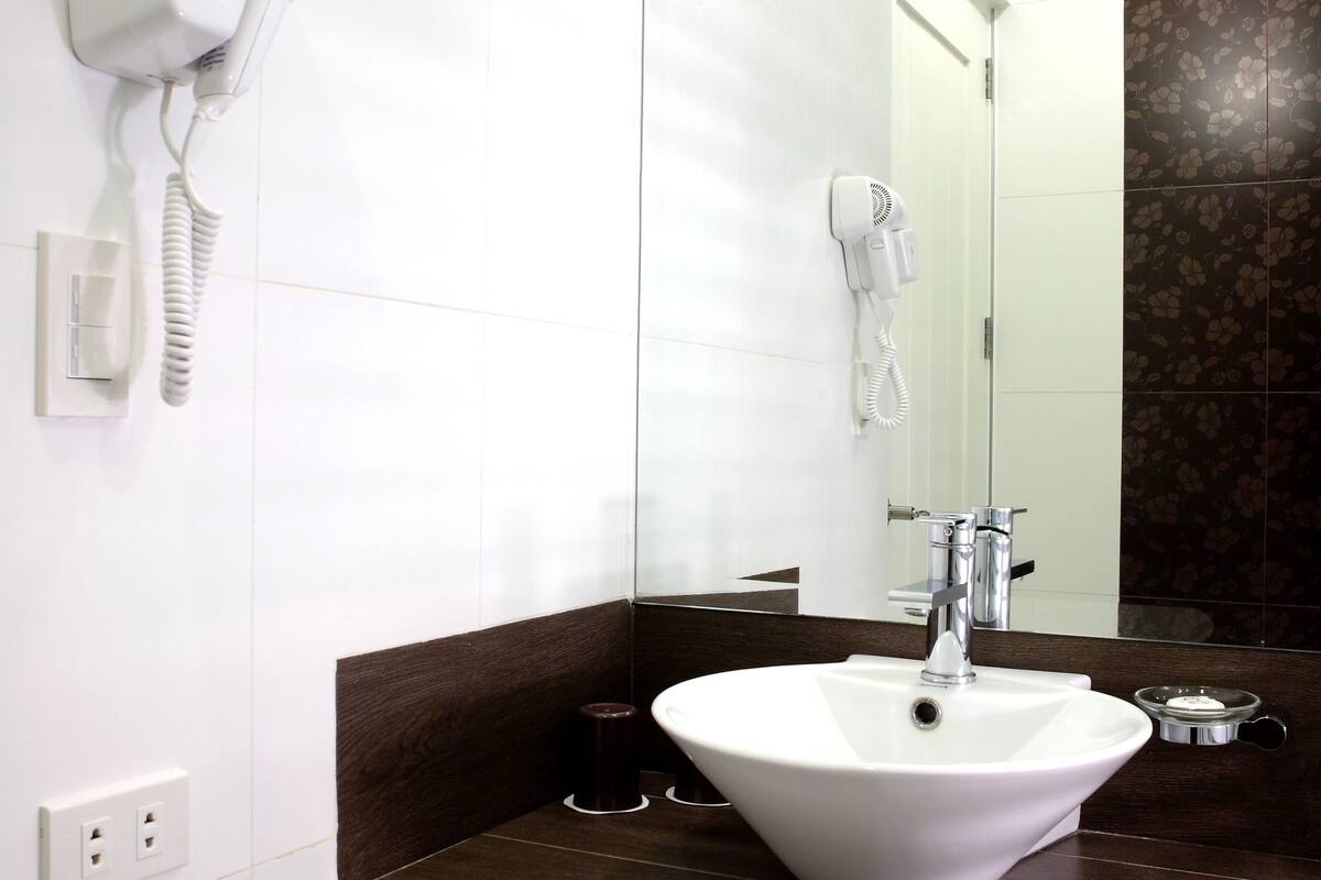 superior room | bathroom | slippers, bidet, towels