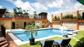 Outdoor pool, open 8:00 AM to 10:00 PM, pool umbrellas, pool loungers