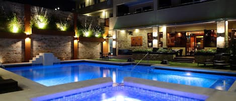 Outdoor pool, open 8:00 AM to 10:00 PM, pool umbrellas, pool loungers
