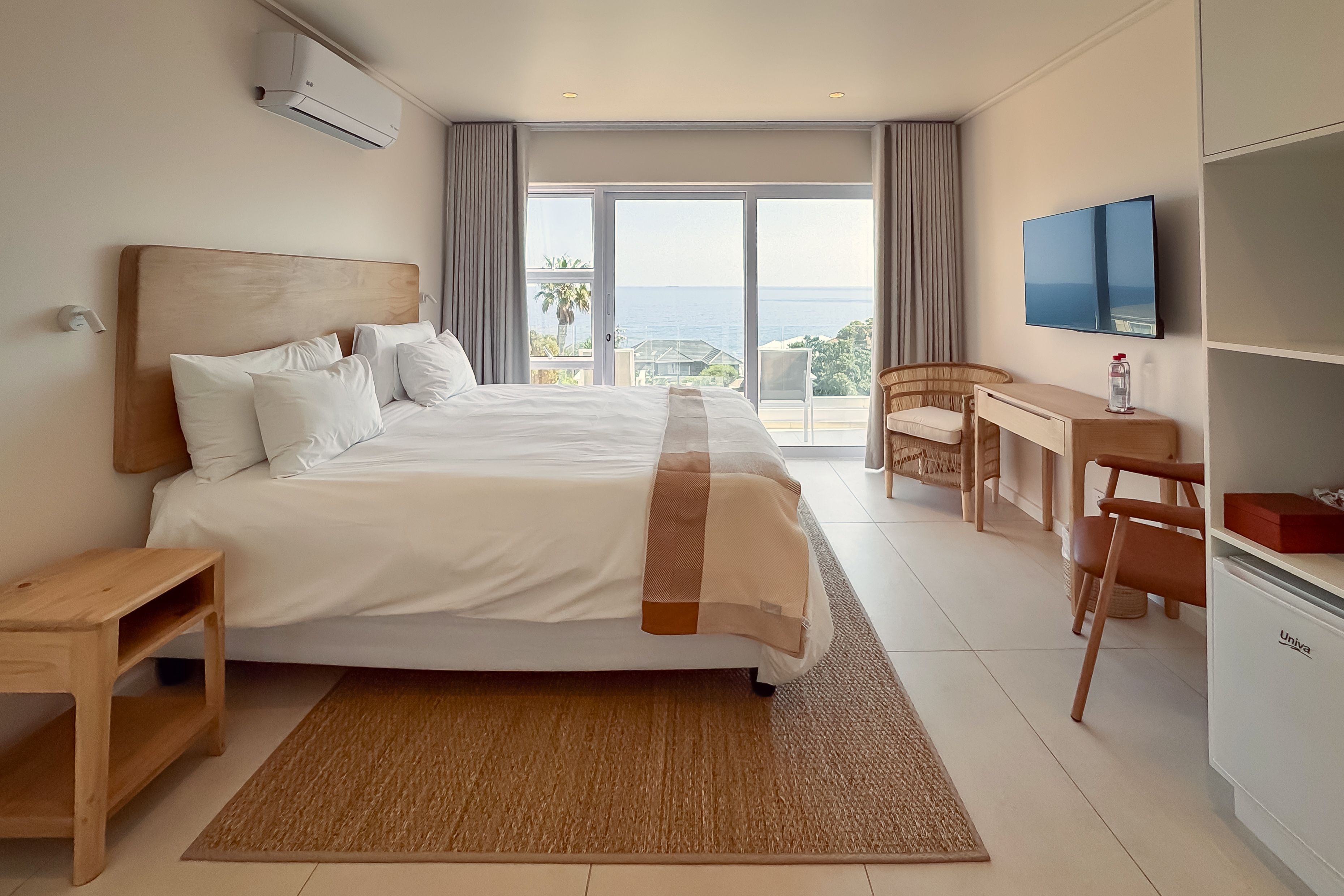 Sea View Room - Bath and Shower (2) | In-room safe, blackout drapes, iron/ironing board (on request)