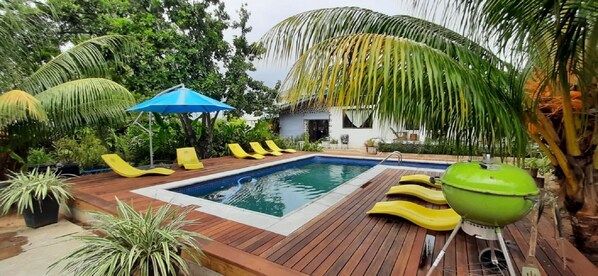 Outdoor pool, pool umbrellas, pool loungers