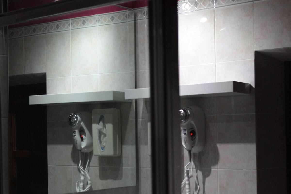 junior suite, garden view | bathroom | shower, free toiletries, hair dryer, bidet