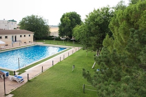 Seasonal outdoor pool, open 4:30 PM to 8:30 PM, sun loungers