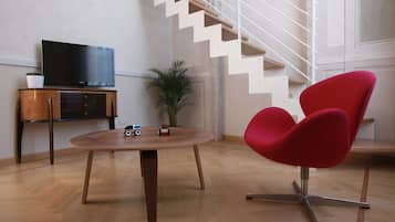 Chambre Double Deluxe, vue ville | Coin séjour