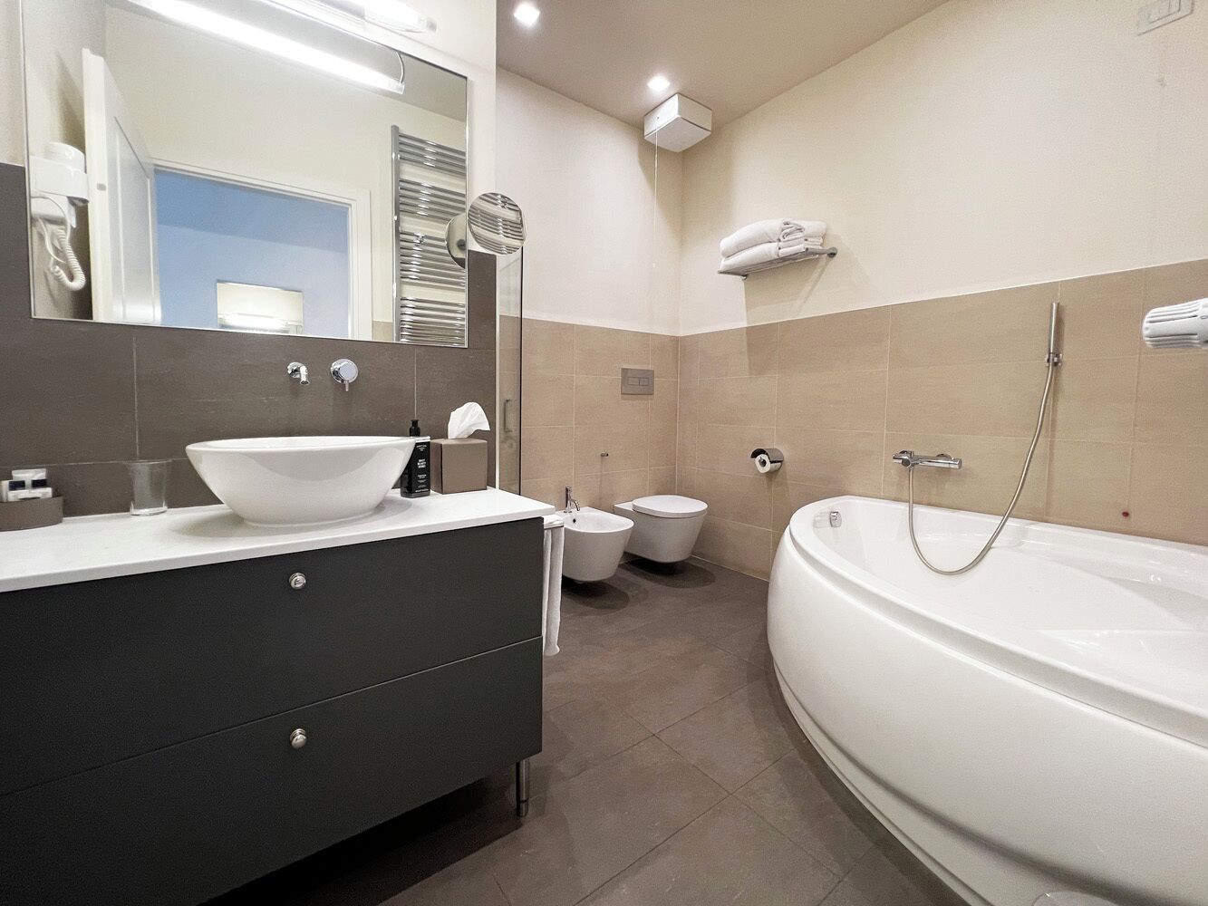 junior suite (2 adults) | bathroom | free toiletries, hair dryer, bidet, towels
