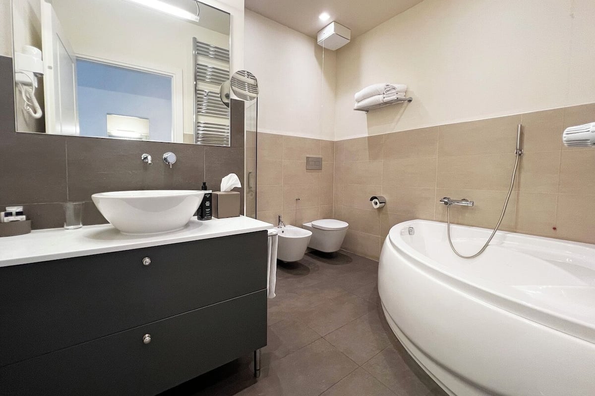 junior suite (2 adults) | bathroom | free toiletries, hair dryer, bidet, towels