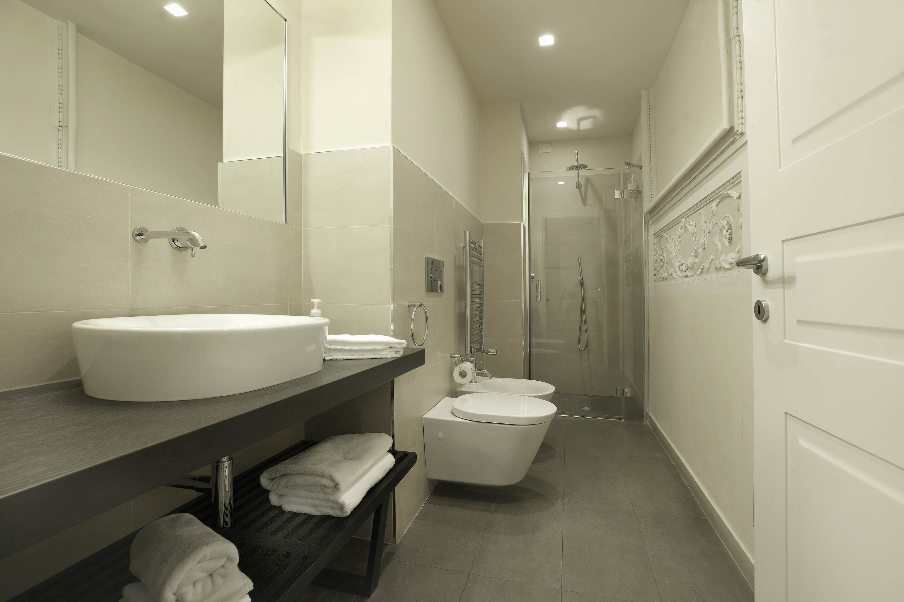 free toiletries, hair dryer, bidet, towels