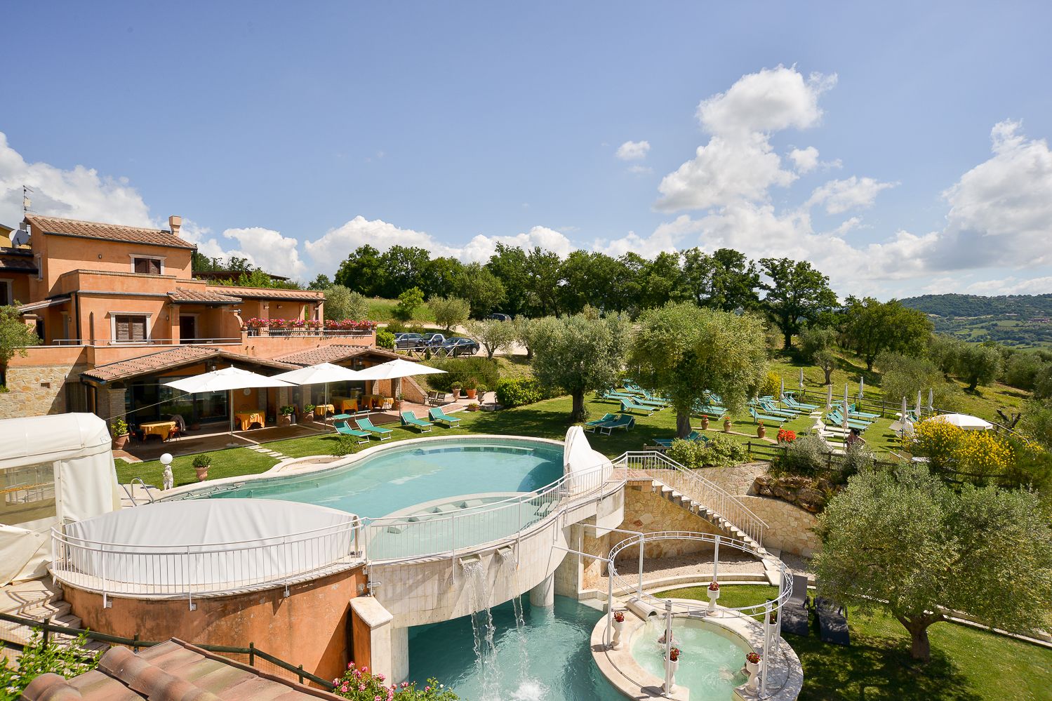 outdoor pool, open 9:00 am to 7:00 pm, pool loungers