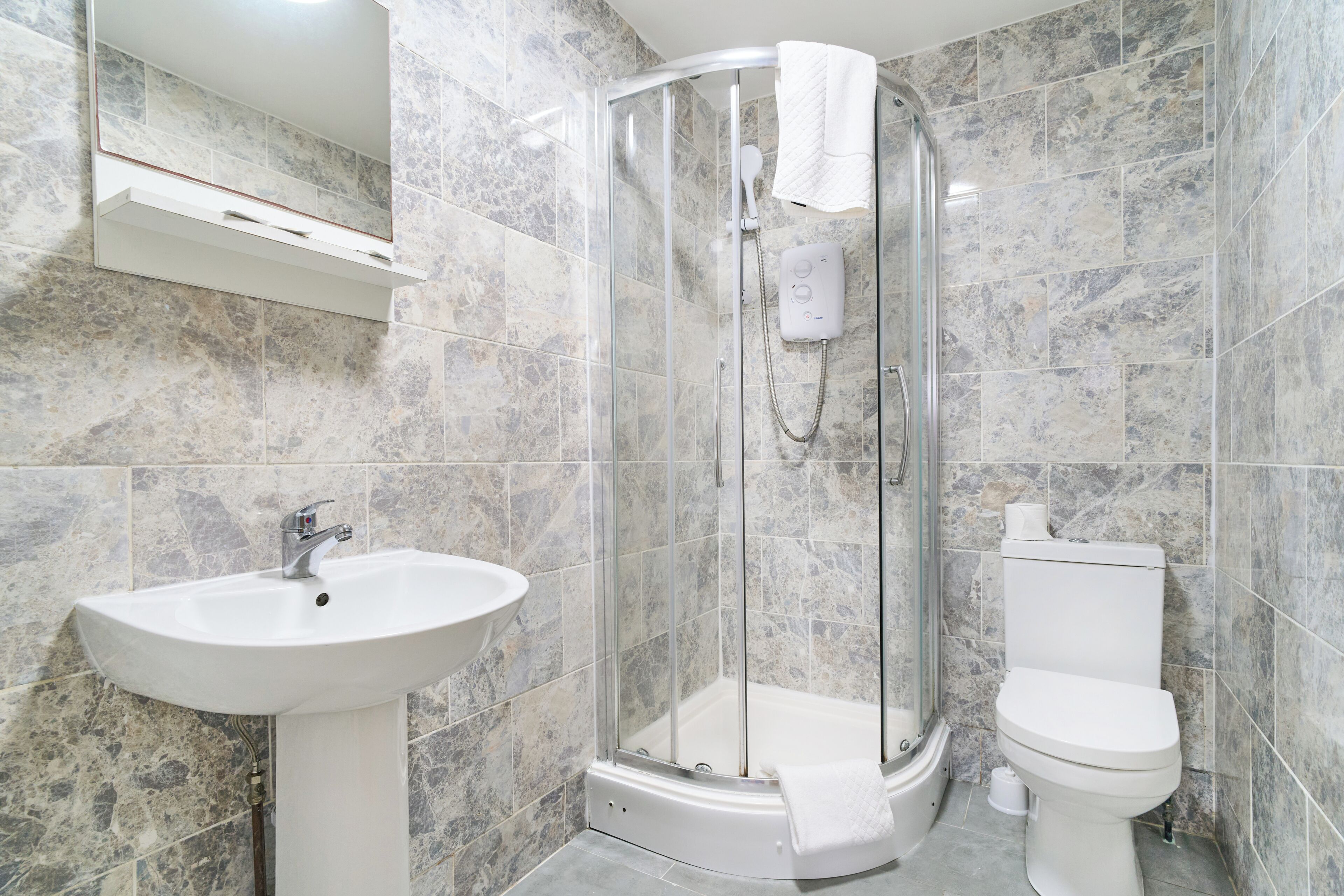 Shower, towels, soap, shampoo